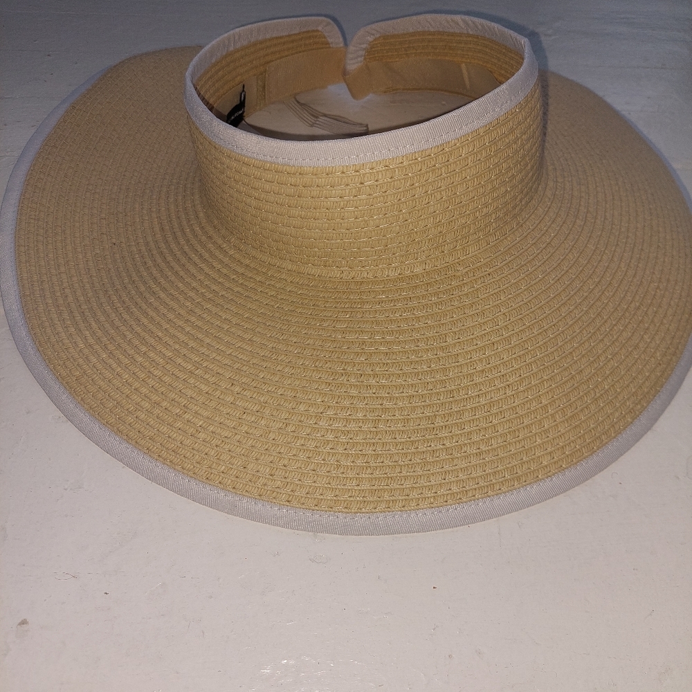 Tan and white sun  visor. Never been worn
